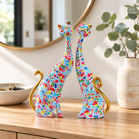 Couple de chats en mosaïque sur une console d'entrée