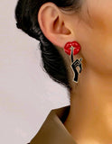 boucles d'oreilles lèvres rouge